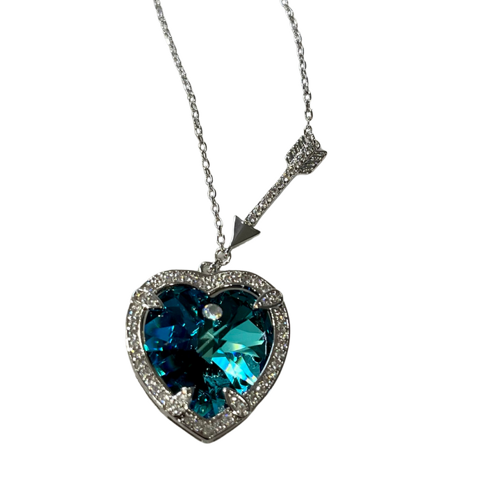 Silver 925 Ocean Blue Heart Necklace Swarovski Crystal with an arrow attached to the dainty chain pointing to the heart. Very elegant and trendy.